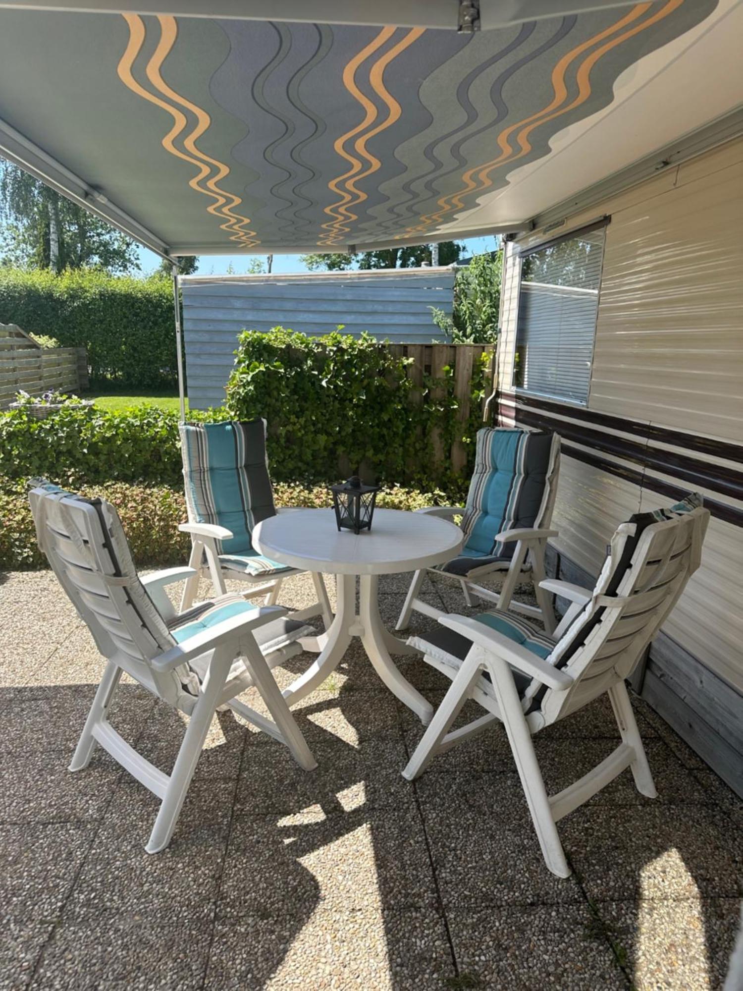 Gezellige Stacaravan Met Groot, Zonnig Terras! Belt-Schutsloot Экстерьер фото